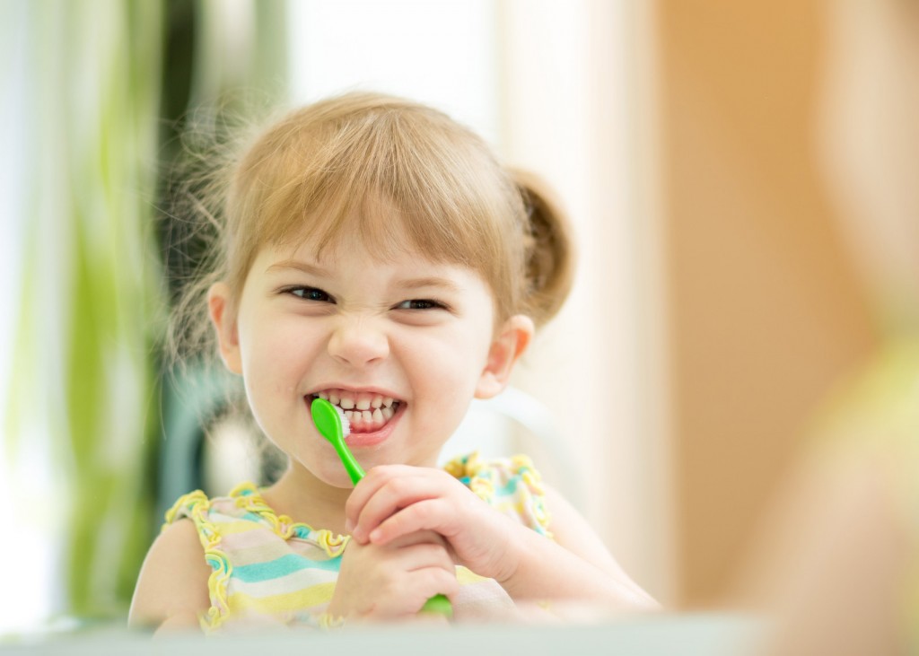girl brushing teeth for headstart Ohio Valley Opportunities